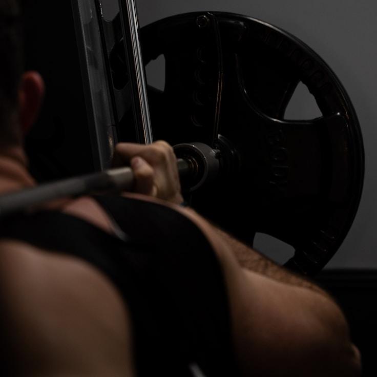 Weight training area with free weights and machines